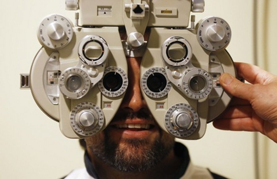 International Rugby Board referee Steve Walsh gets his eyes tested as part of a publicity event in Sydney. 
