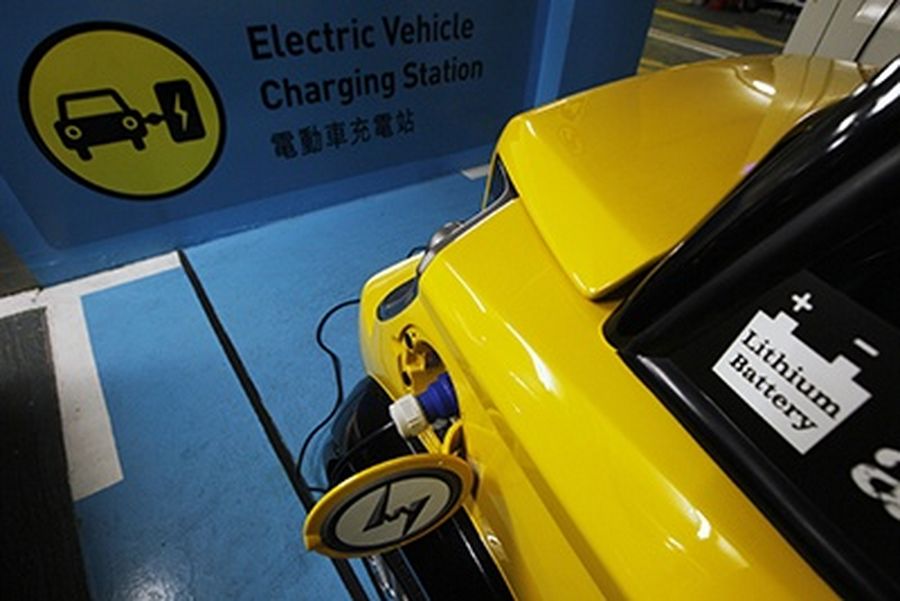 The latest version of “My Car”, an electric car made by the Hong Kong Polytechnic University, is recharged in Hong Kong.