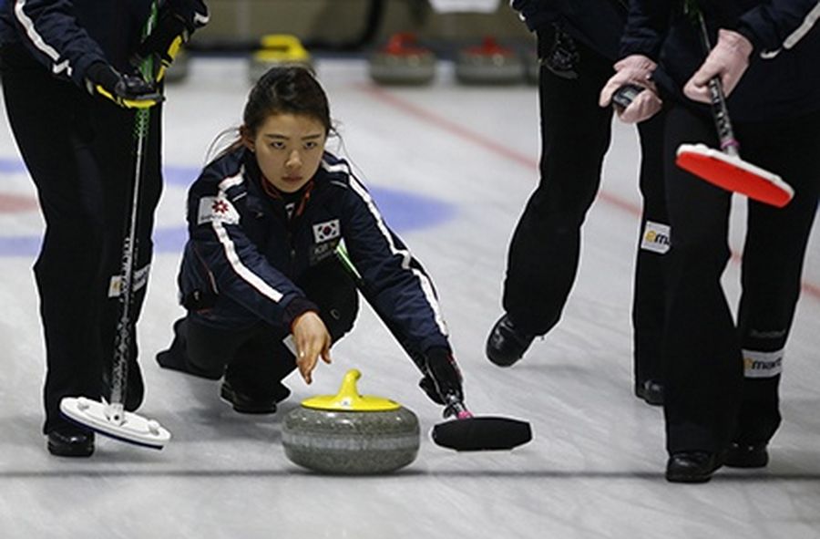 South Korean national curling team player Lee Seul-bee delivers the stone during a training session at the Taereung National Training Ceter in Seoul.