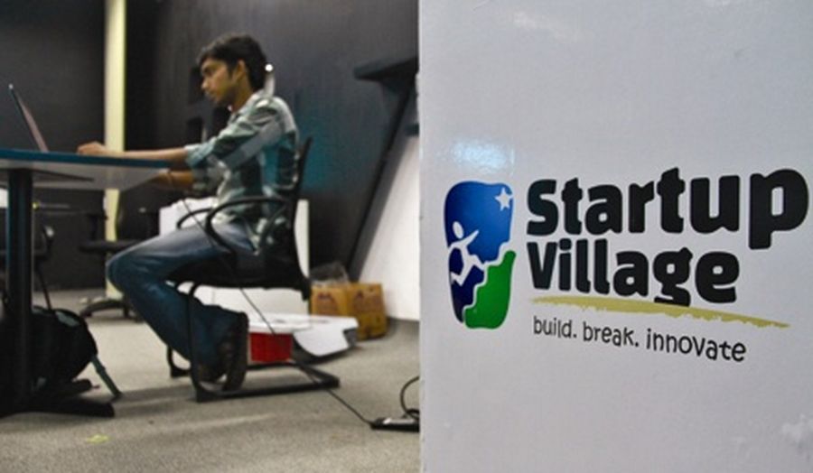 An employee works on his laptop at the Start-up Village in Kinfra High Tech Park in the southern Indian city of Kochi. 