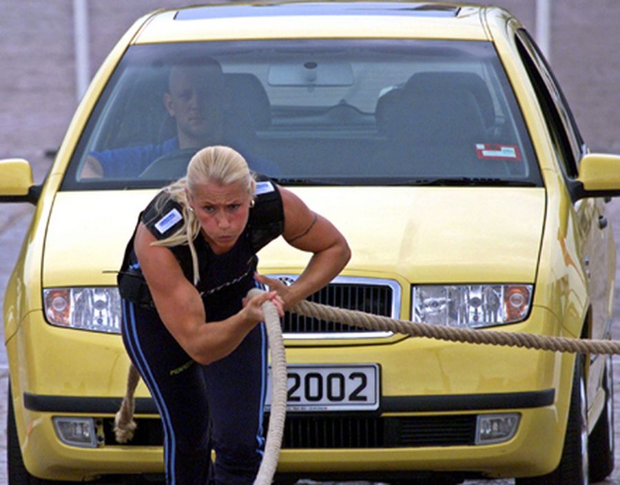 Heini Koivuniemi of Finland pulls a car weighing about 1500 kgs (3307 lbs) during the World's Strong