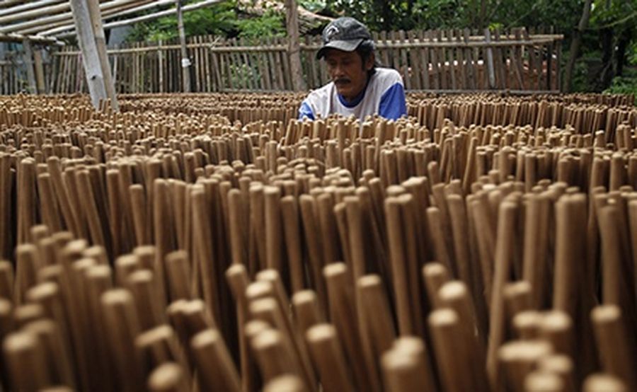 A worker dries incense at a factory in Tangerang preparing for Chinese Lunar New Year.