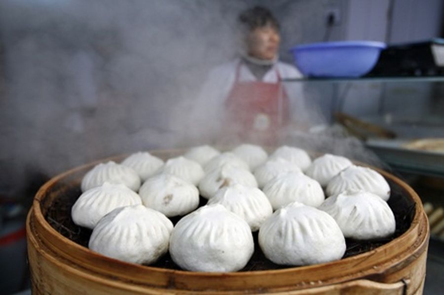 A steaming bamboo tray of dumplings at a store in Shanghai. 