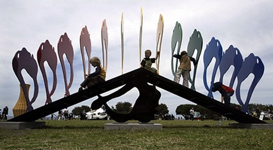 Liam Tucker, Rhys Tucker, Rory Eagle and Harry Longworth (L-R) conquer a sculpture at the ‘Sculpture By the Sea’ exhibit in Bondi Beach, Australia.